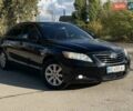 Черный Тойота Камри, объемом двигателя 2.4 л и пробегом 244 тыс. км за 8700 $, фото 1 на Automoto.ua