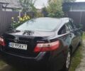 Черный Тойота Камри, объемом двигателя 2.36 л и пробегом 265 тыс. км за 9500 $, фото 1 на Automoto.ua