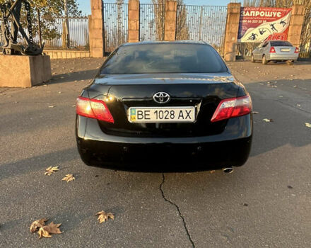 Черный Тойота Камри, объемом двигателя 2.4 л и пробегом 263 тыс. км за 8500 $, фото 1 на Automoto.ua