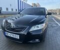 Черный Тойота Камри, объемом двигателя 2.4 л и пробегом 220 тыс. км за 8900 $, фото 1 на Automoto.ua