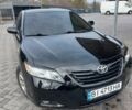 Чорний Тойота Камрі, об'ємом двигуна 2.4 л та пробігом 170 тис. км за 11600 $, фото 3 на Automoto.ua