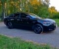 Чорний Тойота Камрі, об'ємом двигуна 2.4 л та пробігом 235 тис. км за 8700 $, фото 1 на Automoto.ua