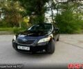 Черный Тойота Камри, объемом двигателя 2.4 л и пробегом 236 тыс. км за 9500 $, фото 1 на Automoto.ua