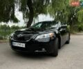 Черный Тойота Камри, объемом двигателя 2.4 л и пробегом 263 тыс. км за 6700 $, фото 1 на Automoto.ua