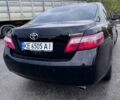 Черный Тойота Камри, объемом двигателя 2.4 л и пробегом 240 тыс. км за 8700 $, фото 4 на Automoto.ua