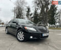 Черный Тойота Камри, объемом двигателя 2.4 л и пробегом 238 тыс. км за 8500 $, фото 1 на Automoto.ua
