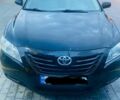 Черный Тойота Камри, объемом двигателя 2.4 л и пробегом 274 тыс. км за 7500 $, фото 1 на Automoto.ua