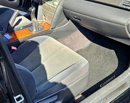 Черный Тойота Камри, объемом двигателя 2.4 л и пробегом 233 тыс. км за 8500 $, фото 7 на Automoto.ua