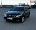 Черный Тойота Камри, объемом двигателя 2.36 л и пробегом 237 тыс. км за 8700 $, фото 1 на Automoto.ua