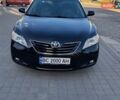 Черный Тойота Камри, объемом двигателя 2.4 л и пробегом 212 тыс. км за 10900 $, фото 1 на Automoto.ua