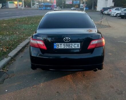 Черный Тойота Камри, объемом двигателя 2.4 л и пробегом 322 тыс. км за 7000 $, фото 2 на Automoto.ua