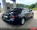 Черный Тойота Камри, объемом двигателя 2.4 л и пробегом 320 тыс. км за 8000 $, фото 1 на Automoto.ua