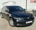 Черный Тойота Камри, объемом двигателя 2.4 л и пробегом 216 тыс. км за 6900 $, фото 1 на Automoto.ua