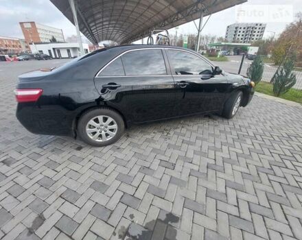 Черный Тойота Камри, объемом двигателя 2.4 л и пробегом 170 тыс. км за 11500 $, фото 14 на Automoto.ua