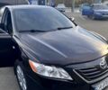 Черный Тойота Камри, объемом двигателя 2.4 л и пробегом 280 тыс. км за 8800 $, фото 1 на Automoto.ua