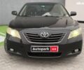Чорний Тойота Камрі, об'ємом двигуна 2.4 л та пробігом 224 тис. км за 7990 $, фото 1 на Automoto.ua