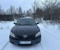 Черный Тойота Камри, объемом двигателя 2.4 л и пробегом 230 тыс. км за 7350 $, фото 1 на Automoto.ua