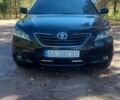 Черный Тойота Камри, объемом двигателя 2.4 л и пробегом 338 тыс. км за 9000 $, фото 1 на Automoto.ua