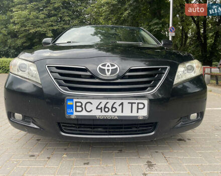 Чорний Тойота Камрі, об'ємом двигуна 2.4 л та пробігом 230 тис. км за 8499 $, фото 1 на Automoto.ua