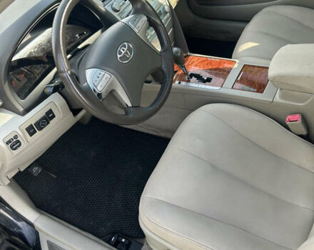 Черный Тойота Камри, объемом двигателя 2.4 л и пробегом 306 тыс. км за 8000 $, фото 1 на Automoto.ua