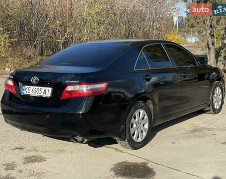 Черный Тойота Камри, объемом двигателя 2.4 л и пробегом 244 тыс. км за 8700 $, фото 6 на Automoto.ua