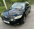 Черный Тойота Камри, объемом двигателя 2.4 л и пробегом 306 тыс. км за 8000 $, фото 1 на Automoto.ua