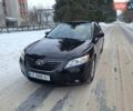 Черный Тойота Камри, объемом двигателя 2.36 л и пробегом 248 тыс. км за 8400 $, фото 1 на Automoto.ua