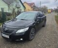 Черный Тойота Камри, объемом двигателя 3.5 л и пробегом 300 тыс. км за 7800 $, фото 1 на Automoto.ua