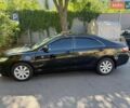 Чорний Тойота Камрі, об'ємом двигуна 2.4 л та пробігом 240 тис. км за 4900 $, фото 1 на Automoto.ua