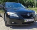 Черный Тойота Камри, объемом двигателя 2.36 л и пробегом 185 тыс. км за 8000 $, фото 1 на Automoto.ua