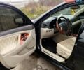 Черный Тойота Камри, объемом двигателя 2.4 л и пробегом 290 тыс. км за 9000 $, фото 1 на Automoto.ua