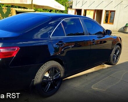 Черный Тойота Камри, объемом двигателя 2.4 л и пробегом 233 тыс. км за 8500 $, фото 3 на Automoto.ua