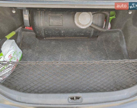 Черный Тойота Камри, объемом двигателя 2.4 л и пробегом 267 тыс. км за 8200 $, фото 19 на Automoto.ua