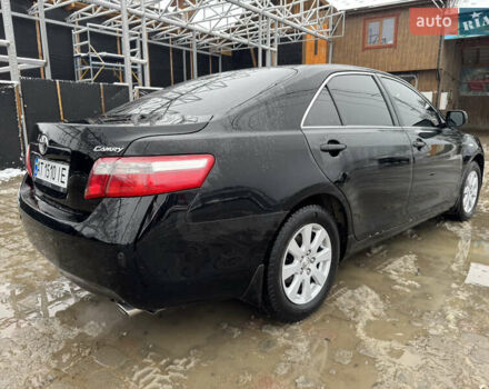 Чорний Тойота Камрі, об'ємом двигуна 2.4 л та пробігом 260 тис. км за 10500 $, фото 5 на Automoto.ua