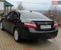 Черный Тойота Камри, объемом двигателя 2.4 л и пробегом 238 тыс. км за 7699 $, фото 12 на Automoto.ua