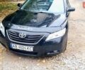 Черный Тойота Камри, объемом двигателя 2.36 л и пробегом 355 тыс. км за 7300 $, фото 1 на Automoto.ua