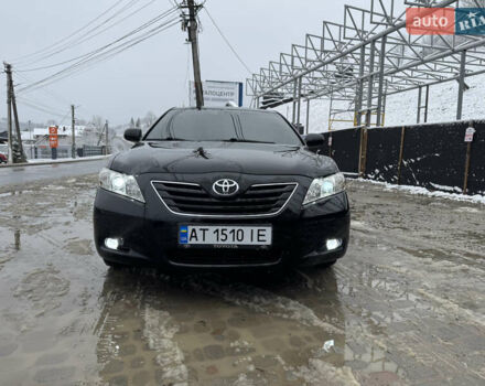 Чорний Тойота Камрі, об'ємом двигуна 2.4 л та пробігом 260 тис. км за 10500 $, фото 1 на Automoto.ua