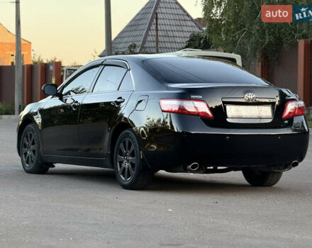 Чорний Тойота Камрі, об'ємом двигуна 3.46 л та пробігом 225 тис. км за 10300 $, фото 3 на Automoto.ua