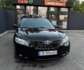 Чорний Тойота Камрі, об'ємом двигуна 2.4 л та пробігом 268 тис. км за 7200 $, фото 1 на Automoto.ua