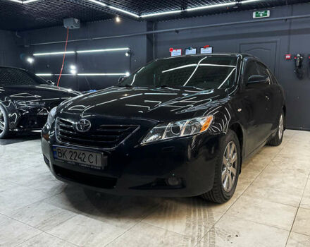 Черный Тойота Камри, объемом двигателя 2.36 л и пробегом 197 тыс. км за 9500 $, фото 1 на Automoto.ua