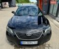 Черный Тойота Камри, объемом двигателя 2.36 л и пробегом 248 тыс. км за 7700 $, фото 1 на Automoto.ua