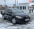 Чорний Тойота Камрі, об'ємом двигуна 2.4 л та пробігом 93 тис. км за 13800 $, фото 1 на Automoto.ua