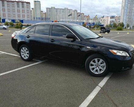 Чорний Тойота Камрі, об'ємом двигуна 2.4 л та пробігом 261 тис. км за 8300 $, фото 1 на Automoto.ua