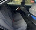 Черный Тойота Камри, объемом двигателя 2.4 л и пробегом 244 тыс. км за 8700 $, фото 21 на Automoto.ua