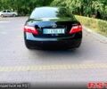 Черный Тойота Камри, объемом двигателя 2.4 л и пробегом 248 тыс. км за 7500 $, фото 2 на Automoto.ua