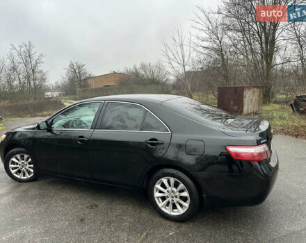 Черный Тойота Камри, объемом двигателя 2.4 л и пробегом 232 тыс. км за 6850 $, фото 2 на Automoto.ua