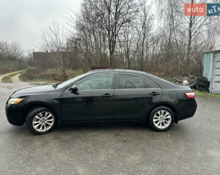 Черный Тойота Камри, объемом двигателя 2.4 л и пробегом 232 тыс. км за 6850 $, фото 1 на Automoto.ua