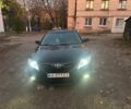 Черный Тойота Камри, объемом двигателя 2.4 л и пробегом 250 тыс. км за 7000 $, фото 1 на Automoto.ua
