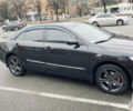 Черный Тойота Камри, объемом двигателя 2.4 л и пробегом 226 тыс. км за 9300 $, фото 3 на Automoto.ua