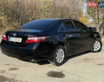 Черный Тойота Камри, объемом двигателя 2.4 л и пробегом 244 тыс. км за 8700 $, фото 5 на Automoto.ua